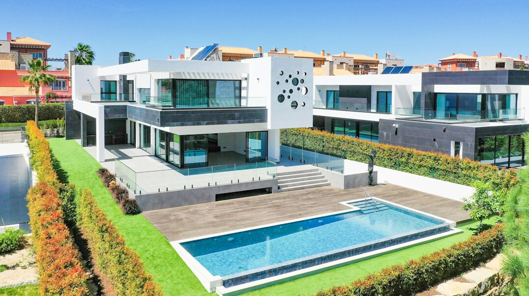 Luxury lakeside villa exterior with pool on the Swiss Riviera