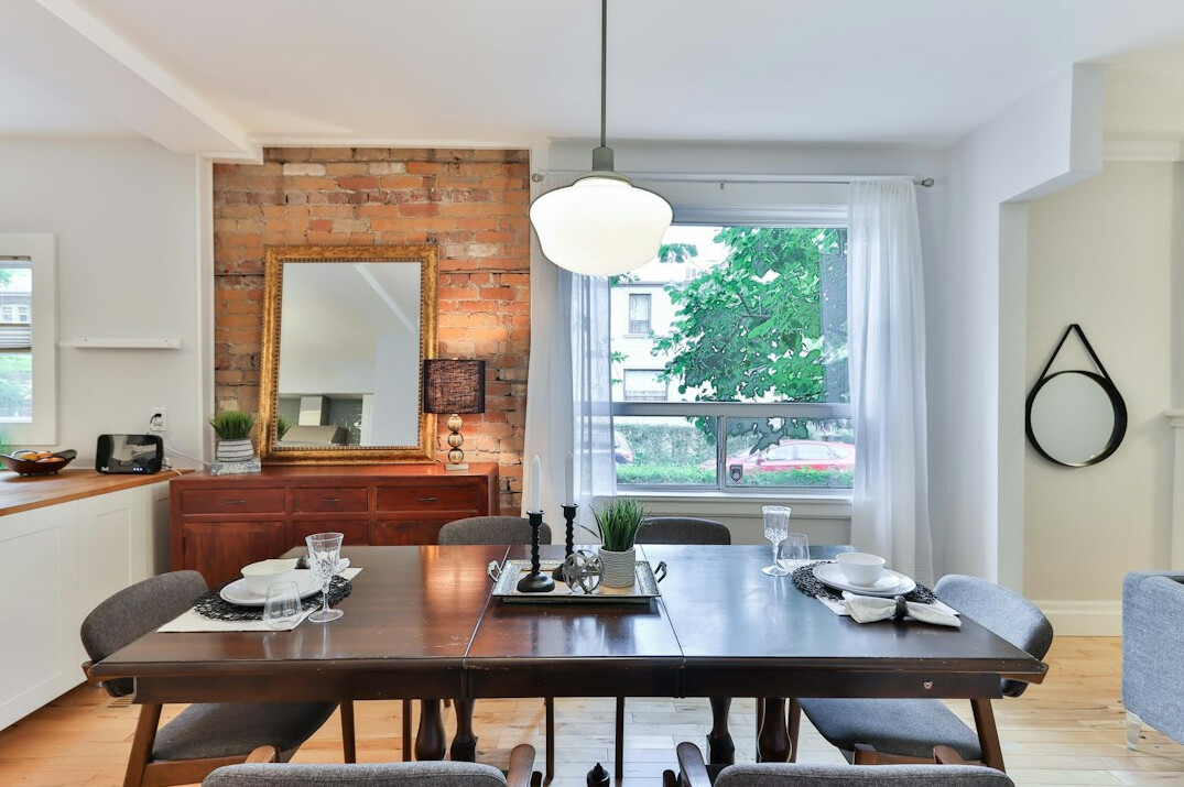 Elegant dining room interior with statement lighting